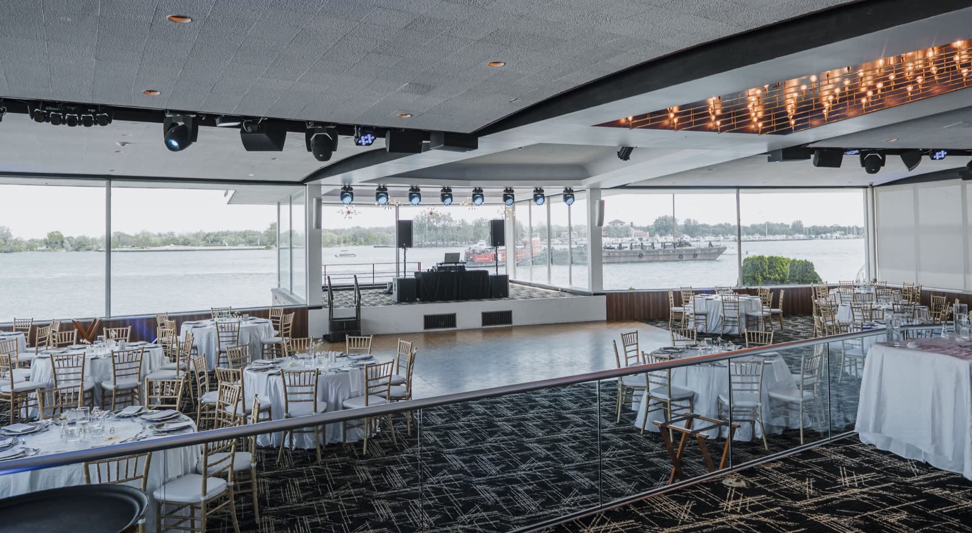 Panoramic Detroit skyline through floor-to-ceiling windows