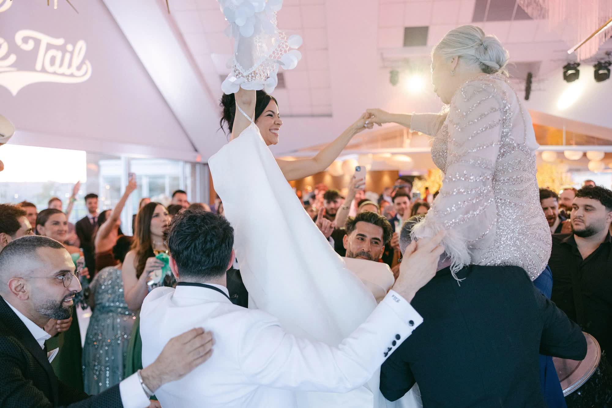 Hora chair dance celebration on the dance floor